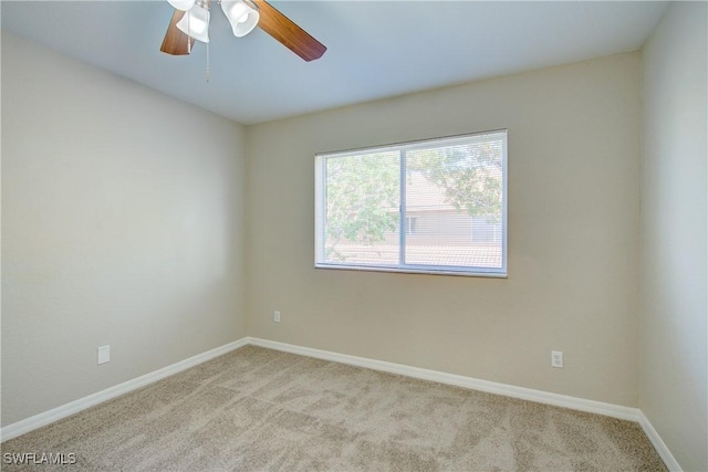 17545 Cherry Ridge Ln, Fort Myers, FL 33967 - spare room featuring baseboards, a ceiling fan, and light colored carpet