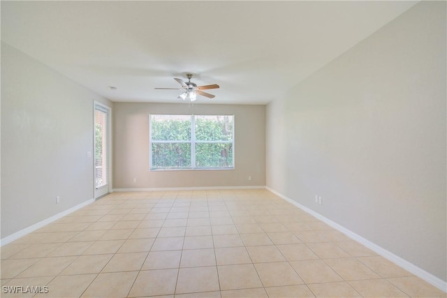 17545 Cherry Ridge Ln, Fort Myers, FL 33967 - spare room with baseboards and a ceiling fan