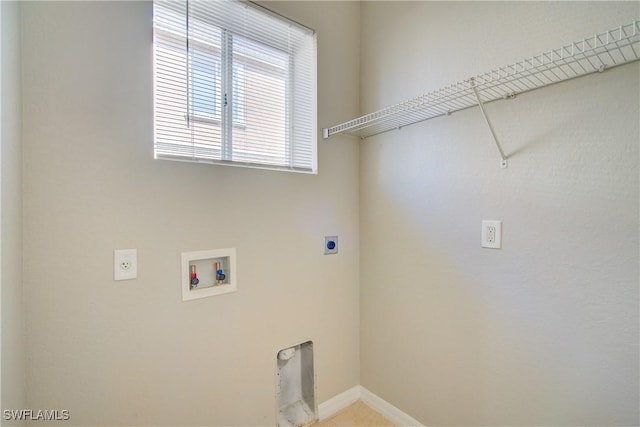 17545 Cherry Ridge Ln, Fort Myers, FL 33967 - clothes washing area with laundry area, baseboards, washer hookup, and hookup for an electric dryer