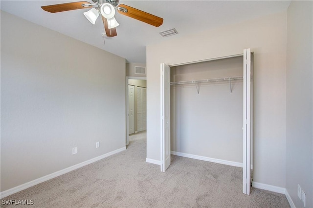 17545 Cherry Ridge Ln, Fort Myers, FL 33967 - unfurnished bedroom with carpet floors, a closet, visible vents, and baseboards
