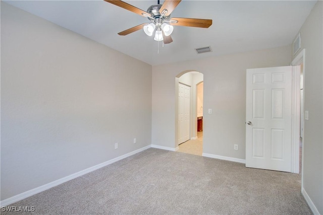 17545 Cherry Ridge Ln, Fort Myers, FL 33967 - unfurnished bedroom featuring arched walkways, carpet floors, visible vents, and baseboards