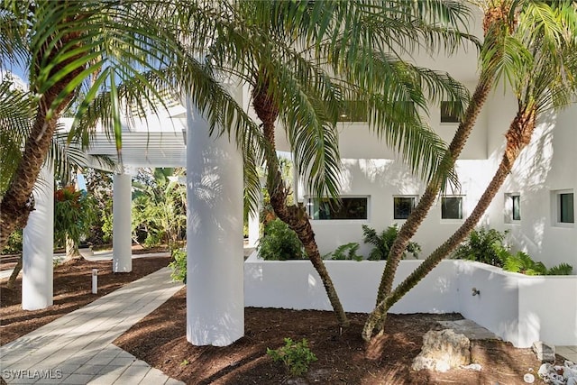 surrounding community with a pergola