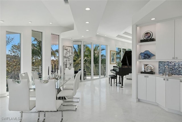 dining room featuring visible vents and recessed lighting