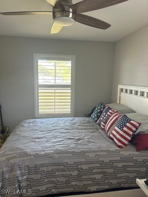 bedroom featuring ceiling fan