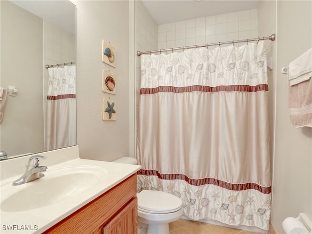 bathroom with tile patterned flooring, vanity, toilet, and a shower with curtain