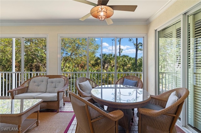 sunroom with a ceiling fan