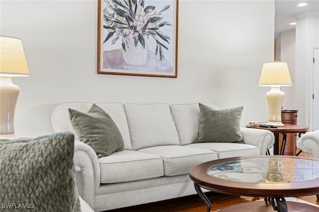 living room with recessed lighting and wood finished floors