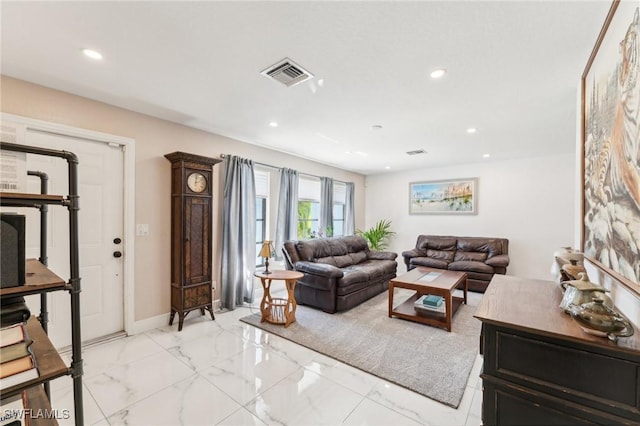 living area with recessed lighting, visible vents, marble finish floor, and baseboards