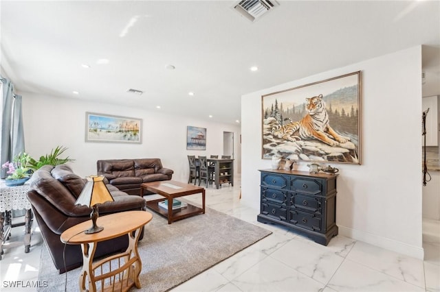 living room with recessed lighting, visible vents, marble finish floor, and baseboards