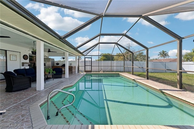 view of pool with an outdoor living space, a fenced in pool, a patio, a fenced backyard, and a ceiling fan