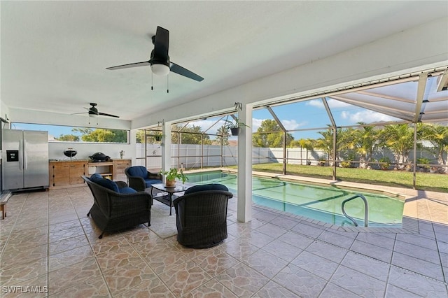 401 SE 14th Ter, Cape Coral, FL 33990 - view of patio / terrace with area for grilling, a ceiling fan, and glass enclosure