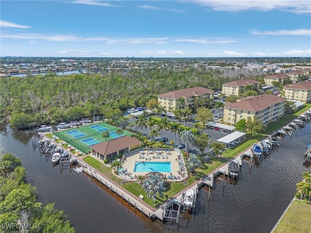 birds eye view of property featuring a water view