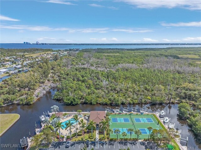 birds eye view of property with a water view