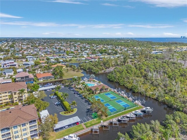 bird's eye view with a water view