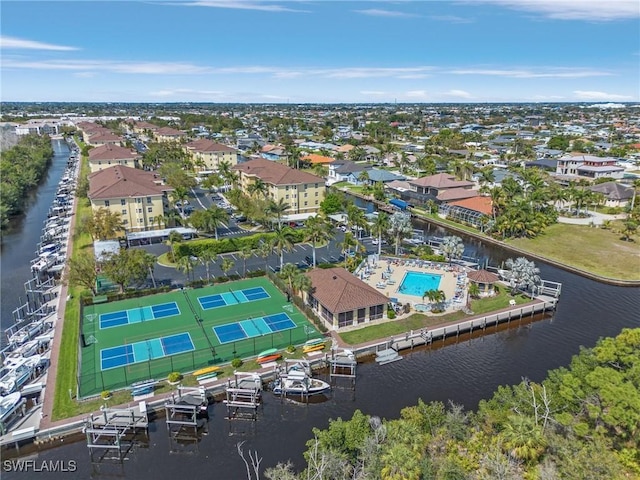 aerial view featuring a residential view and a water view