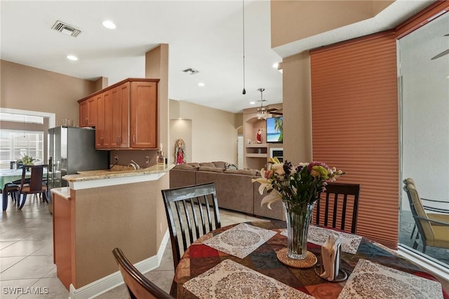 dining room with light tile patterned floors, recessed lighting, visible vents, and ceiling fan