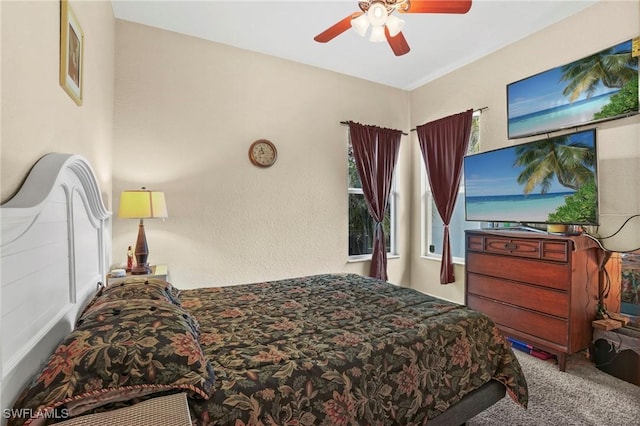 bedroom with carpet and a ceiling fan