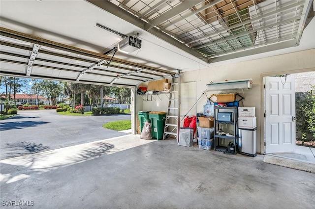 garage featuring a garage door opener