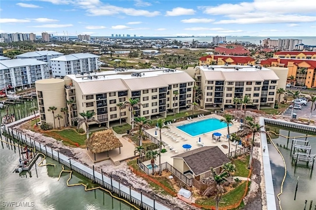 bird's eye view with a water view and a view of city