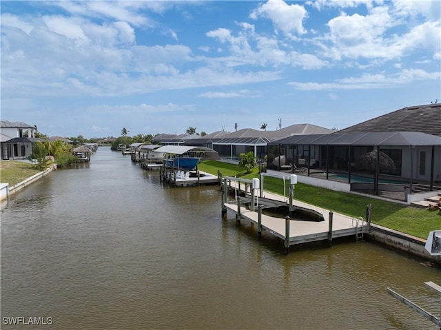 view of dock with a water view, glass enclosure, boat lift, and an outdoor pool