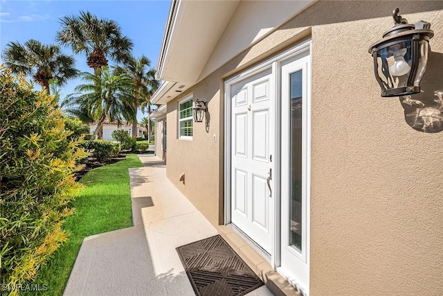 exterior space featuring stucco siding