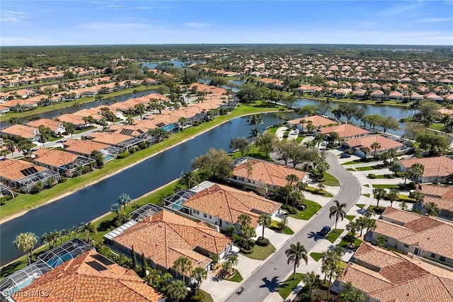 aerial view featuring a residential view and a water view