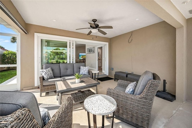 view of patio / terrace featuring an outdoor living space and a ceiling fan