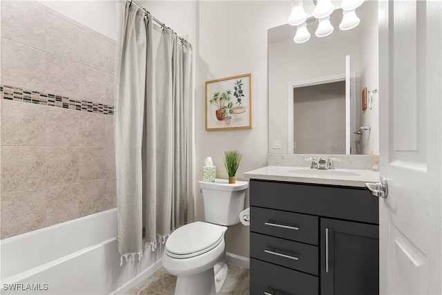 full bath featuring baseboards, vanity, toilet, and shower / bath combo with shower curtain