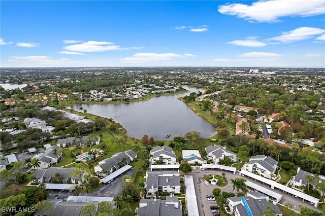 aerial view with a residential view and a water view