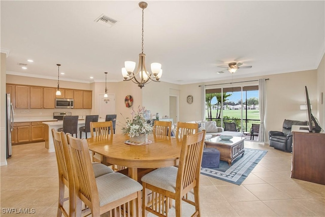 dining space with recessed lighting, visible vents, light tile patterned flooring, and ornamental molding