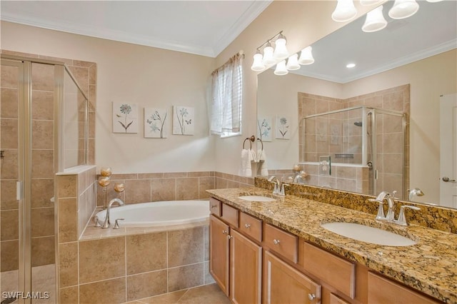 full bath featuring a bath, a shower stall, crown molding, and a sink