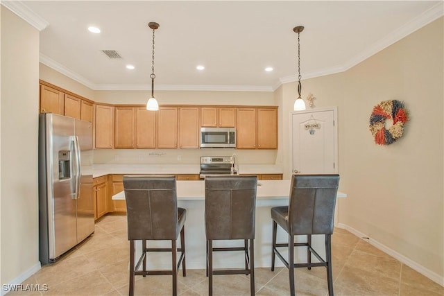 kitchen featuring an island with sink, visible vents, appliances with stainless steel finishes, and light countertops