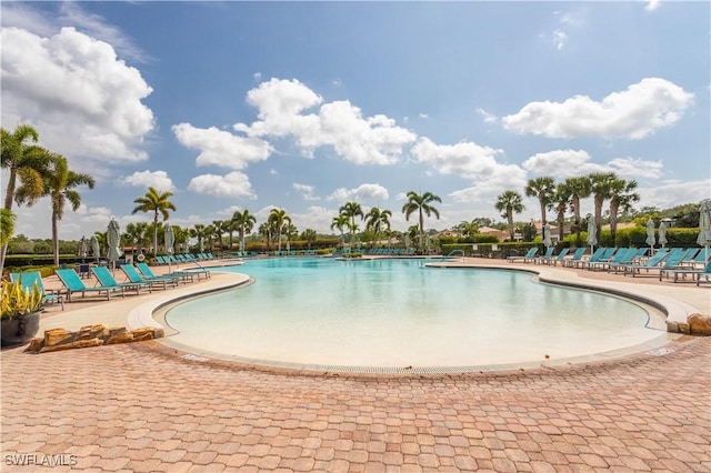 community pool with a patio