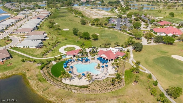 bird's eye view featuring a residential view, golf course view, and a water view