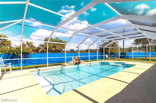 view of swimming pool featuring a fenced in pool, a lanai, and a patio