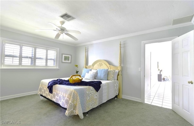 bedroom featuring carpet, visible vents, crown molding, and baseboards