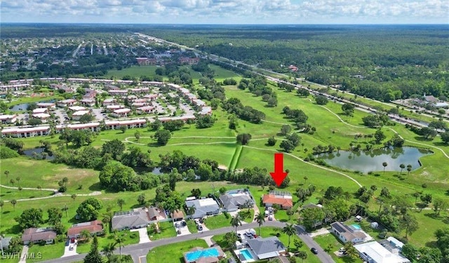 birds eye view of property with a residential view and a water view