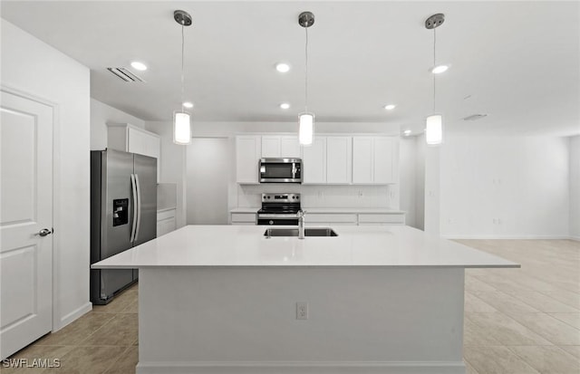 kitchen with light tile patterned floors, stainless steel appliances, a sink, visible vents, and backsplash