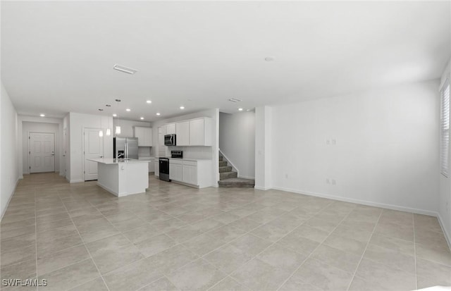 unfurnished living room with light tile patterned flooring, baseboards, stairway, and recessed lighting