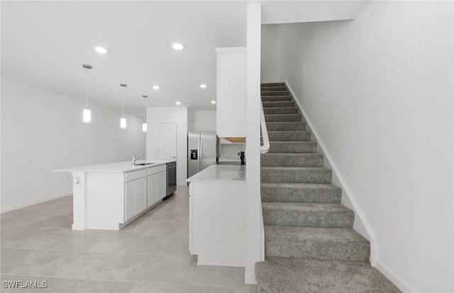 staircase featuring recessed lighting, tile patterned flooring, and baseboards