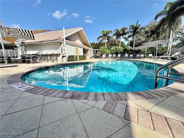 pool featuring a patio