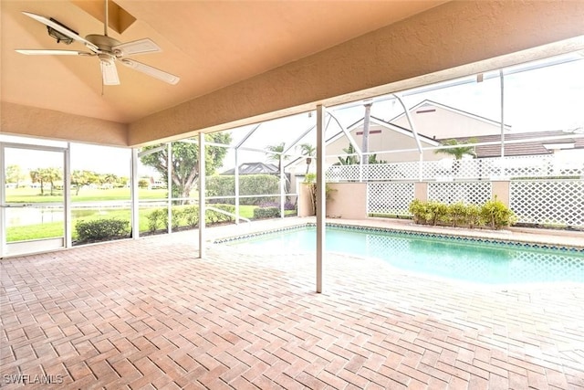 11730 Quail Village Way Unit 103-1, Naples, FL 34119 - outdoor pool with ceiling fan, a patio area, and a lanai