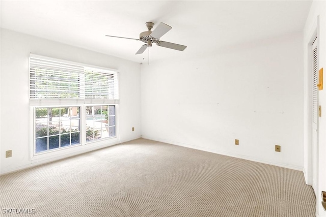 11730 Quail Village Way Unit 103-1, Naples, FL 34119 - carpeted spare room featuring ceiling fan