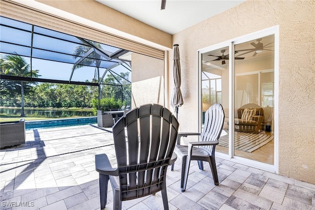 view of patio / terrace featuring a lanai and an outdoor pool