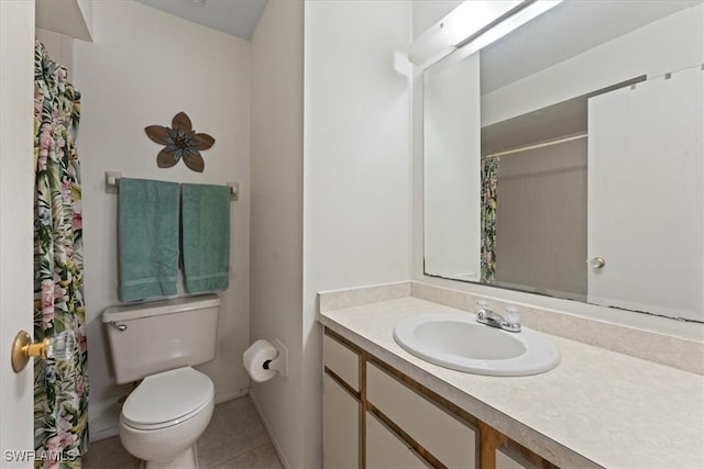 bathroom featuring vanity, tile patterned floors, toilet, and a shower with curtain