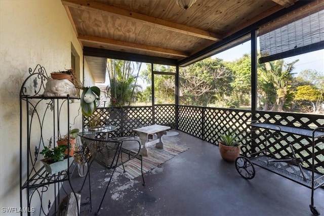 sunroom / solarium with wooden ceiling