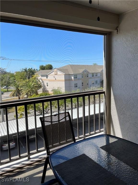 balcony featuring a residential view