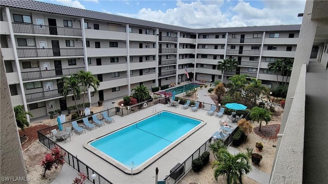 2121 Collier Ave Unit 405, Fort Myers, FL 33901 - pool with fence and a patio