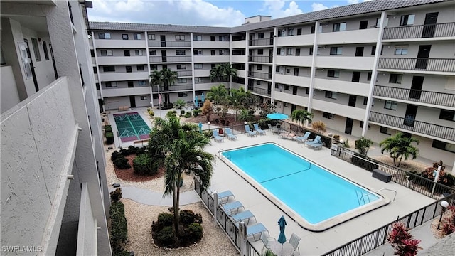 2121 Collier Ave Unit 405, Fort Myers, FL 33901 - community pool featuring fence and a patio