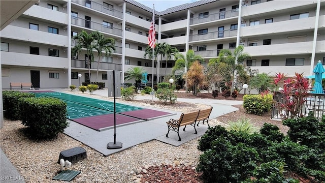 2121 Collier Ave Unit 405, Fort Myers, FL 33901 - view of swimming pool featuring shuffleboard